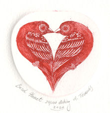 Pair of birds forming a heart