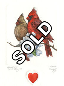 image of male and female cardinals sitting on a branch