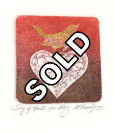 Image of a bird sitting on a heart filled with flowers